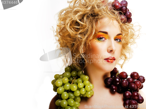 Image of cute blond woman with creative make up and grapes isolated