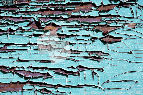 Image of texture of old cracked wood painted blue