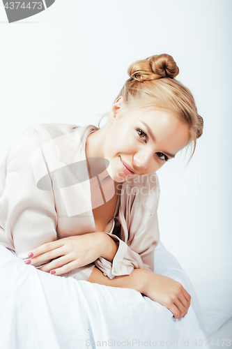 Image of young pretty woman happy smiling, laying in bed, lifestyle people concept