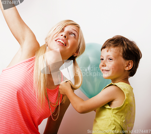 Image of pretty real family with color balloons on white background, blon