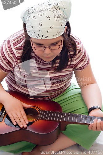 Image of Child With Acoustic Guitar