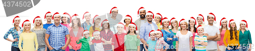 Image of group of happy people in santa hats