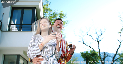 Image of drinking coffee on terrace of villa in the morning