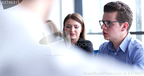 Image of Business Team At A Meeting at modern office building