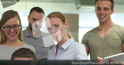 Image of Business Team At A Meeting at modern office building