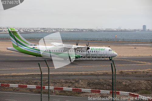 Image of ARECIFE, SPAIN - APRIL, 15 2017: ATR 72 of Binter ready to take 