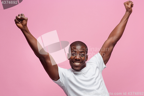 Image of Portrait of a very happy afro American man