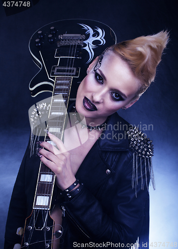 Image of Fashion Rocker Style Model Girl Portrait. Hairstyle. Punk Woman 