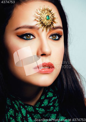 Image of beauty eastern real muslim woman with jewelry close up, bride wi