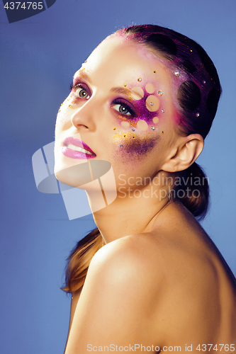 Image of beauty young woman with creative make up, mystery tinsel