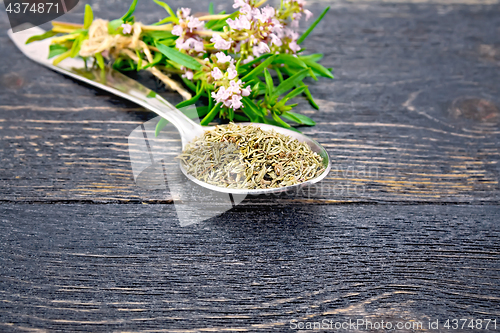 Image of Thyme dry in spoon on board