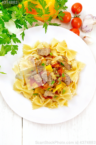Image of Farfalle with turkey and vegetables on board top
