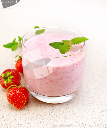 Image of Milkshake strawberry on stone table