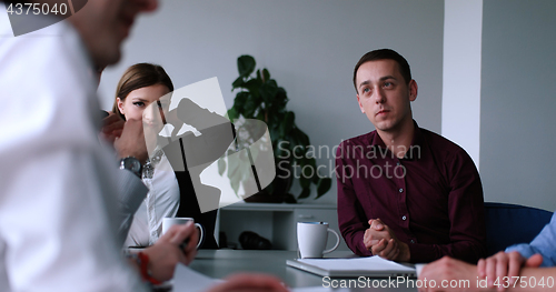 Image of Business Team At A Meeting at modern office building