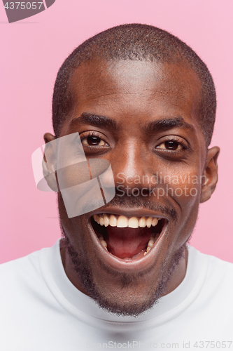 Image of Portrait of a very happy afro American man