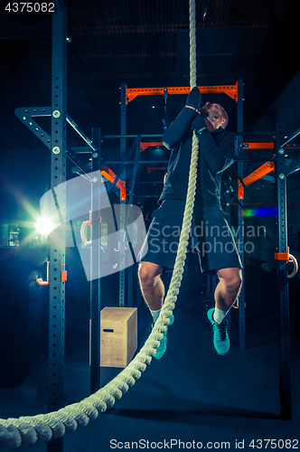 Image of Crossfit athlete with a rope