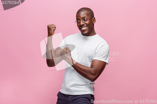 Image of Portrait of a very happy afro American man