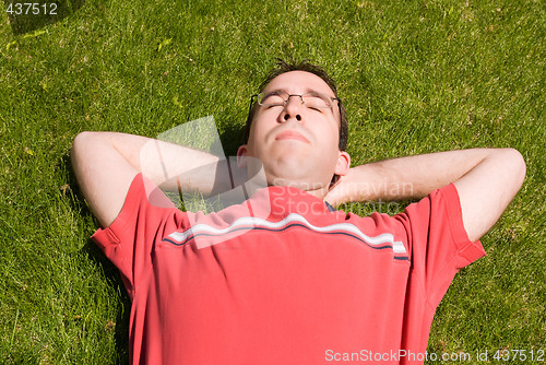 Image of Man Relaxing In The Sun