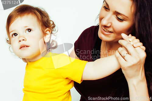 Image of pretty real normal mother with cute blond little daughter close up isolated on white background, lifestyle real people concept