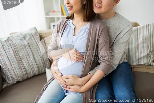 Image of close up of man and pregnant woman