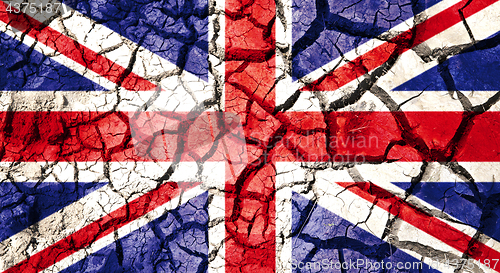 Image of flag of great britain on cracked ground background