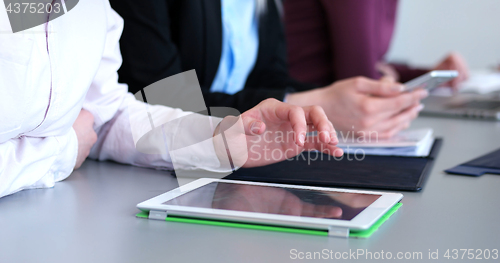 Image of office and teamwork concept - group of business people having a 