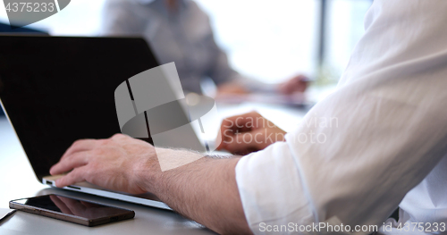 Image of office and teamwork concept - group of business people having a 