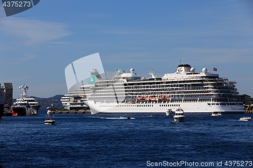 Image of BERGEN HARBOR, NORWAY - MAY 27, 2017: Private boats on a row alo