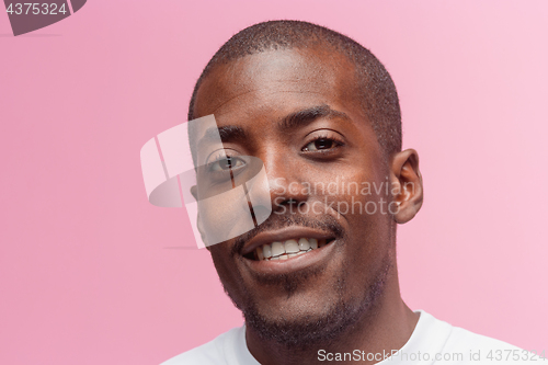 Image of Portrait of a very happy afro American man