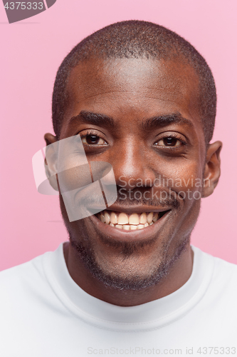 Image of Portrait of a very happy afro American man