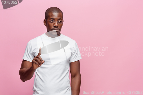 Image of Positive thinking African-American man on pink background