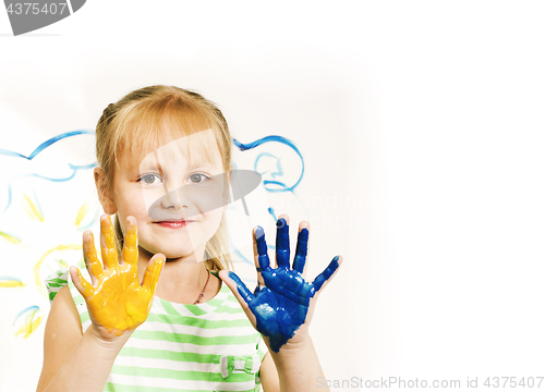 Image of little cute blond girl painting isolated on white background