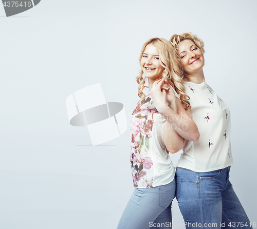 Image of mother with daughter together posing happy smiling isolated on white background with copyspace, lifestyle people concept 