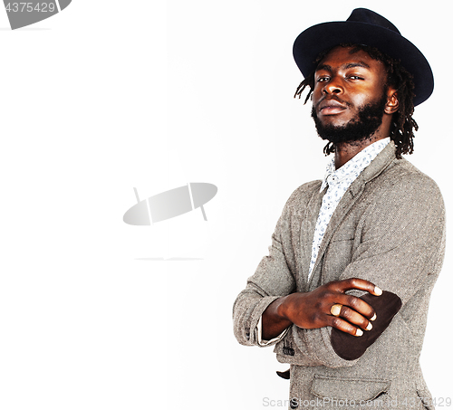 Image of young handsome afro american boy in stylish hipster hat gesturin