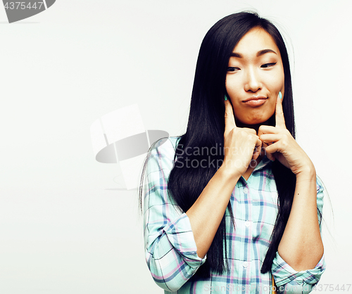 Image of young pretty asian woman posing cheerful emotional isolated on white background, lifestyle people concept 