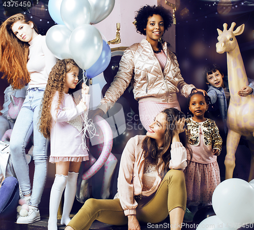 Image of Lifestyle and people concept: young pretty diversity nations woman with different age children celebrating on birth day party together happy smiling, making selfie. African-american, asian and caucasi