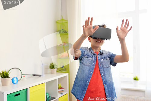 Image of boy in virtual reality headset or 3d glasses