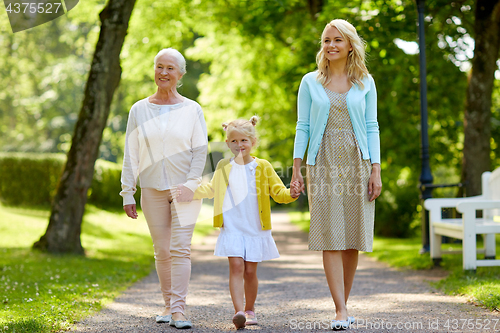 Image of happy mother, daughter and grandmother at park