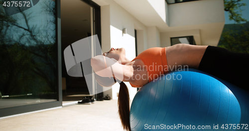 Image of Woman Doing Yoga at villa\'s terase