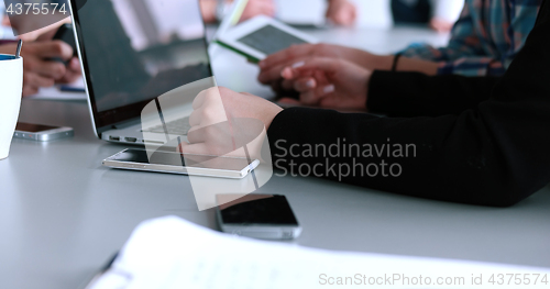 Image of Business Team At A Meeting at modern office building