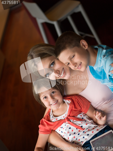 Image of Young Family Using A Tablet To Make Future Plans