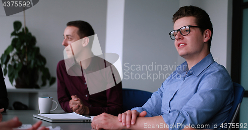 Image of Business Team At A Meeting at modern office building