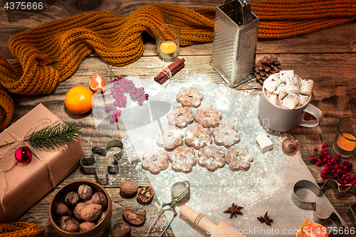 Image of Homemade bakery making, gingerbread cookies in form of Christmas tree close-up.