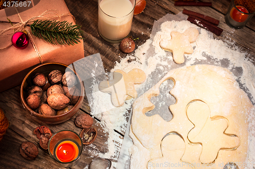 Image of Homemade bakery making, gingerbread cookies in form of Christmas tree close-up.