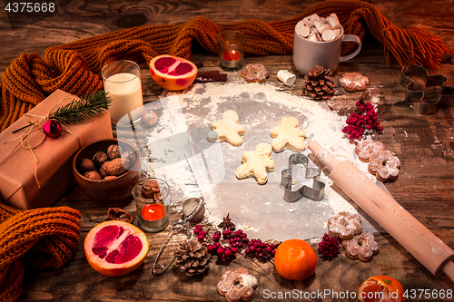 Image of Homemade bakery making, gingerbread cookies in form of Christmas tree close-up.