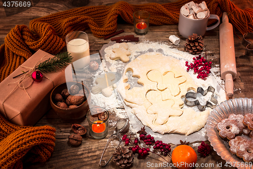 Image of Homemade bakery making, gingerbread cookies in form of Christmas tree close-up.