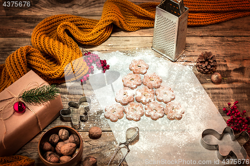 Image of Homemade bakery making, gingerbread cookies in form of Christmas tree close-up.