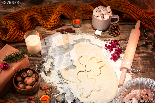 Image of Homemade bakery making, gingerbread cookies in form of Christmas tree close-up.