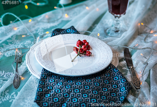 Image of Beautiful Christmas table setting with decorations