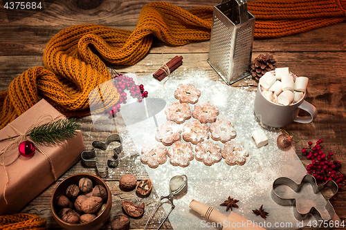 Image of Homemade bakery making, gingerbread cookies in form of Christmas tree close-up.